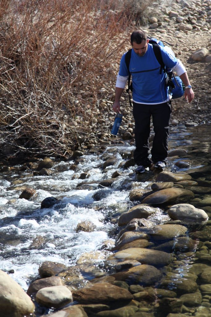 mike crossing a stream